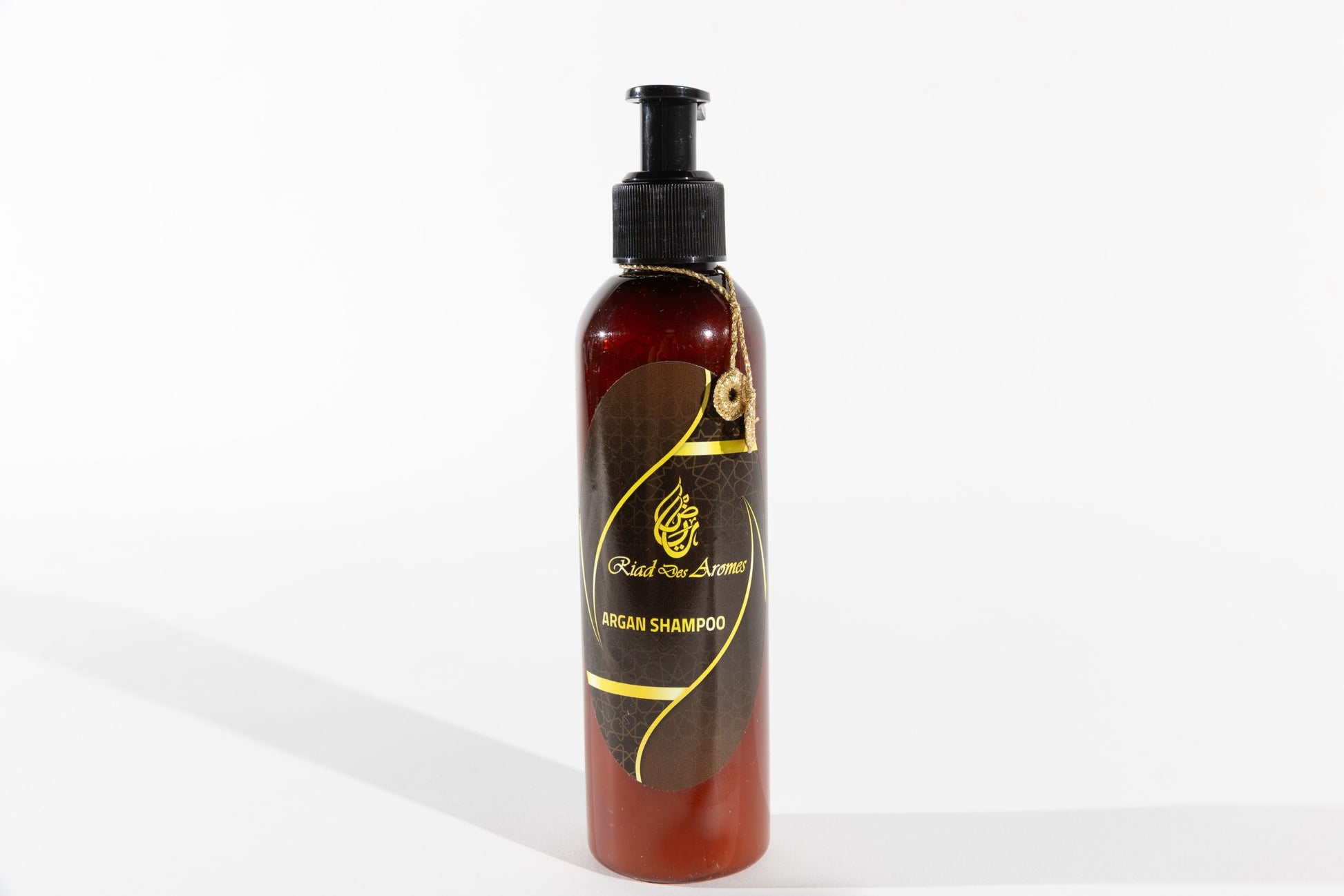 Hydrating Argan Shampoo in a sleek bottle, perfect for cleansing and nourishing hair, leaving it soft, shiny, and healthy.