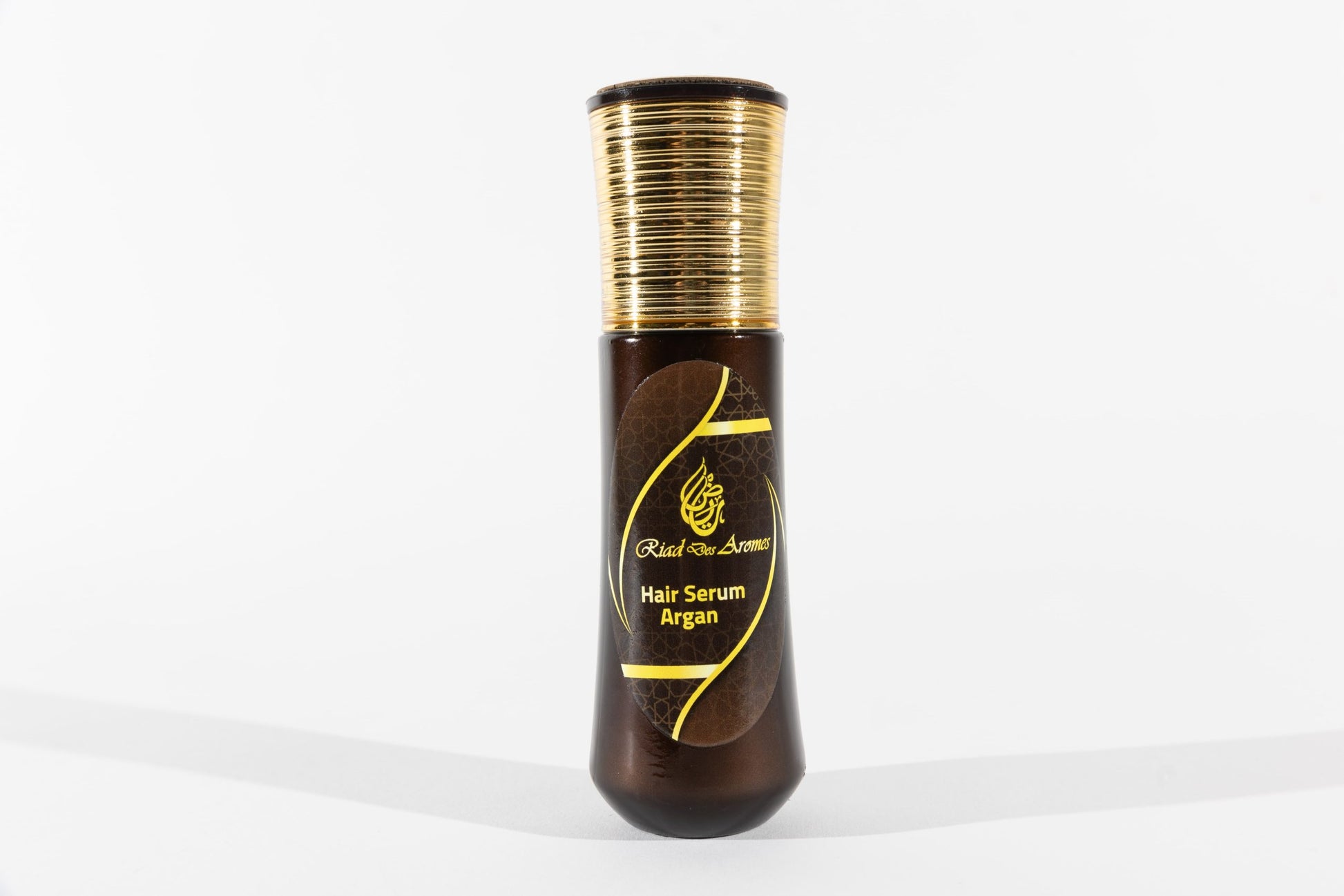 Argan Oil Hair Serum in a sleek bottle, ideal for nourishing and hydrating hair for a shiny, healthy look.